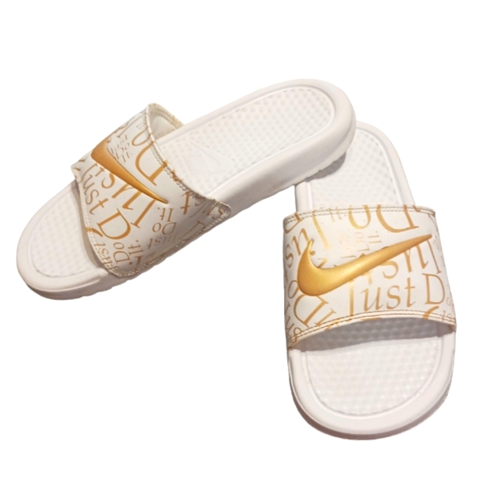 Nike Slides Women's size 7 White and Gold Slip On's
